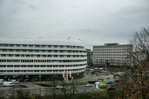 Street view of modern buildings in Wrocław, Polska, capturing urban architecture.
