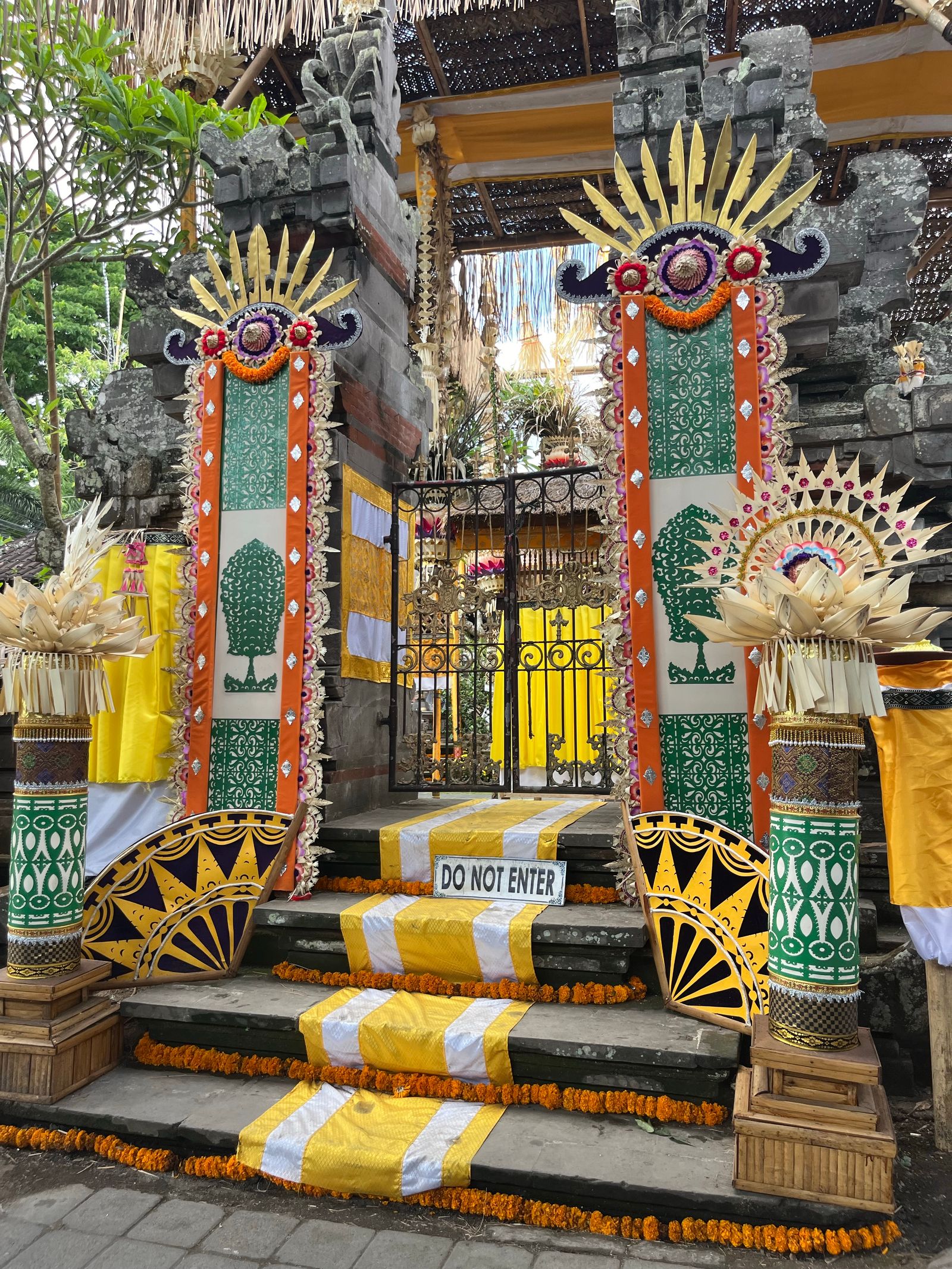 Balinese temple gate with offerings