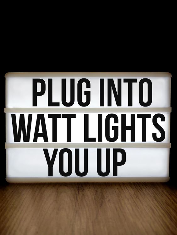 Inspirational Quote on Lightbox with Wooden Surface · Free Stock Photo
