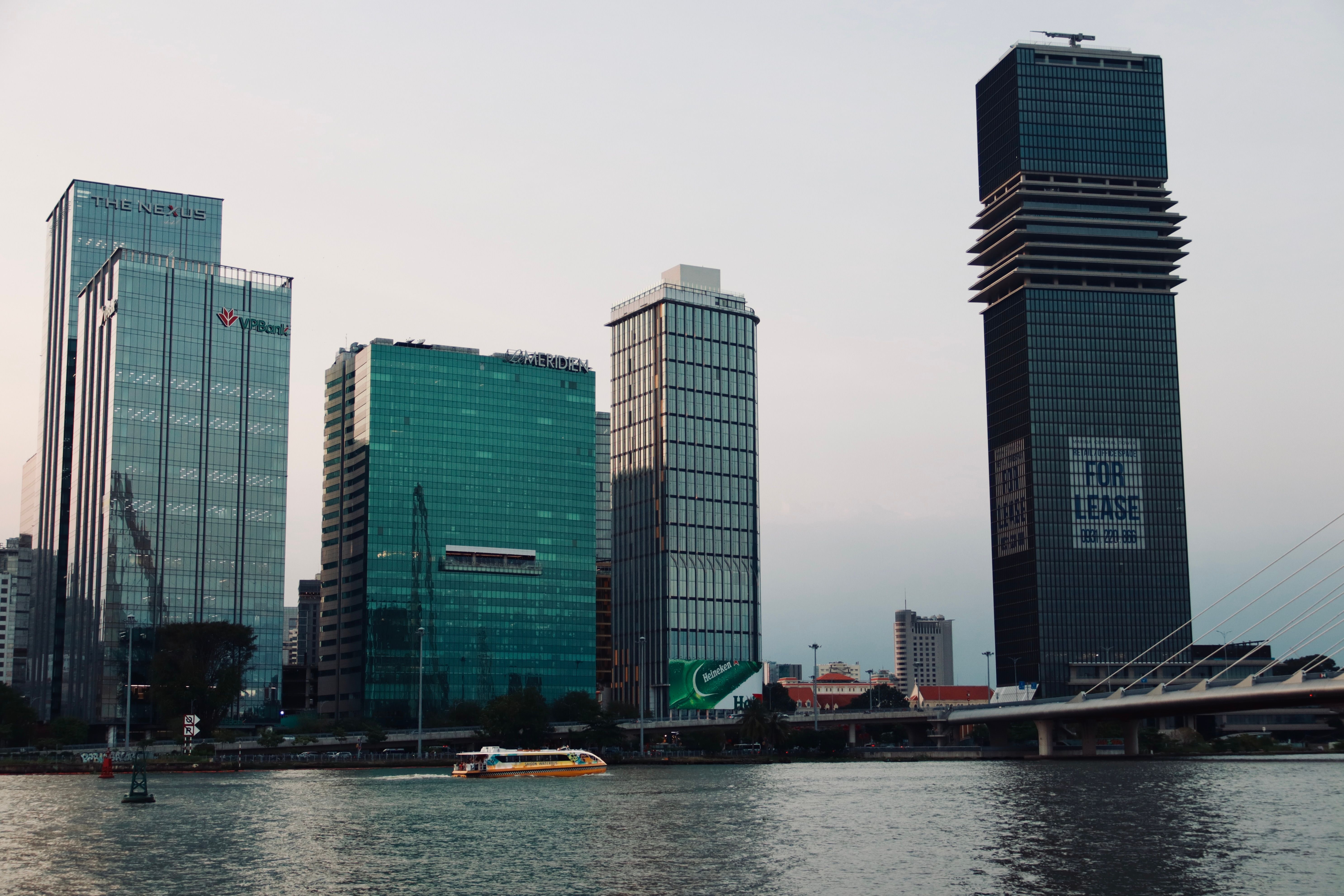 Skyline View of Modern Buildings by Riverside · Free Stock Photo
