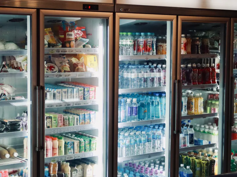 Refrigerated display with beverages and snacks, similar to the store aisles where many Kenmore fridges were sold Refrigerated display with beverages and snacks, similar to the store aisles where many Kenmore fridges were sold