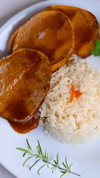 Beef With Red Chile Sauce And Seasoned Rice Meal