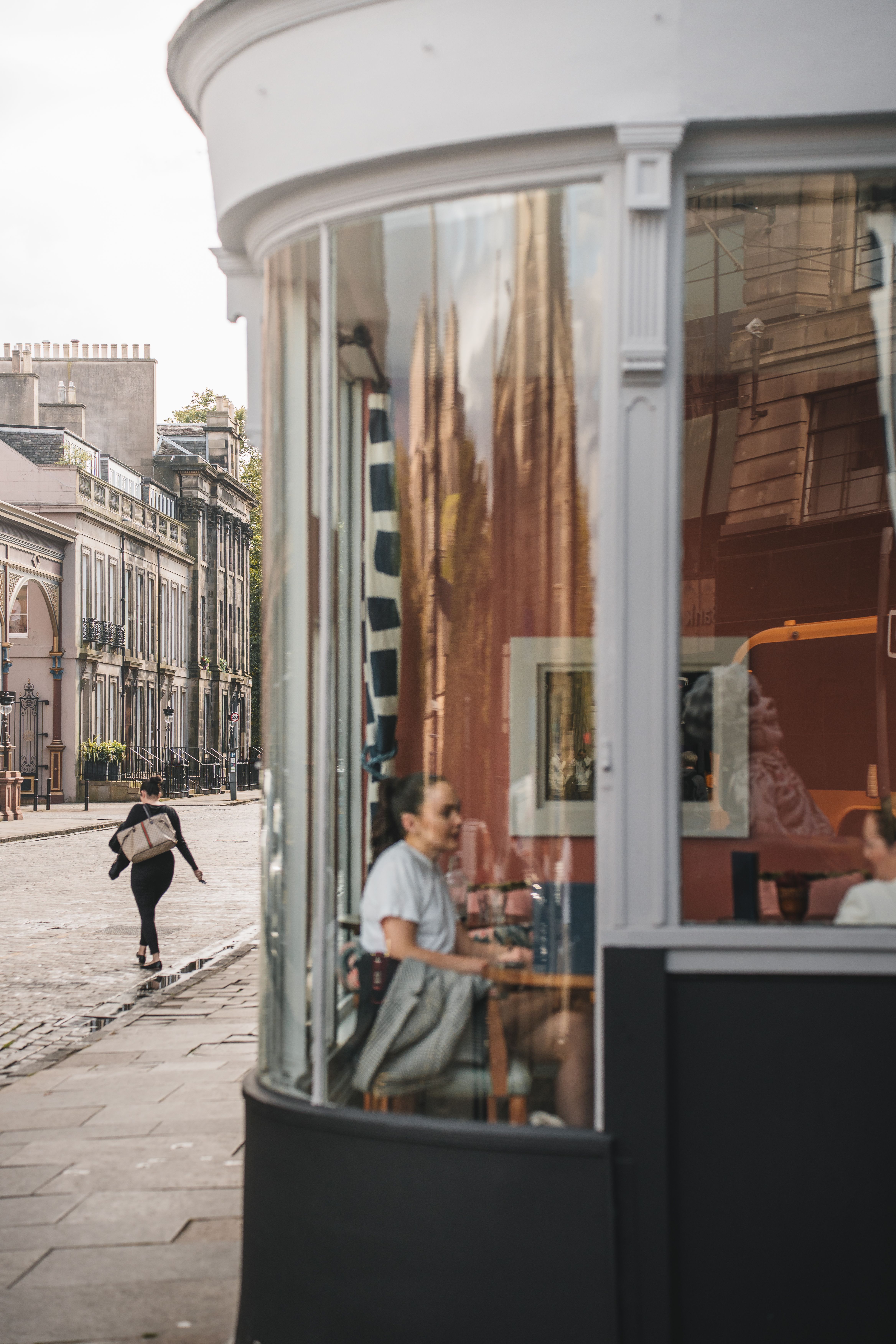 Café Window Reflection in Edinburgh Street Scene · Free Stock Photo