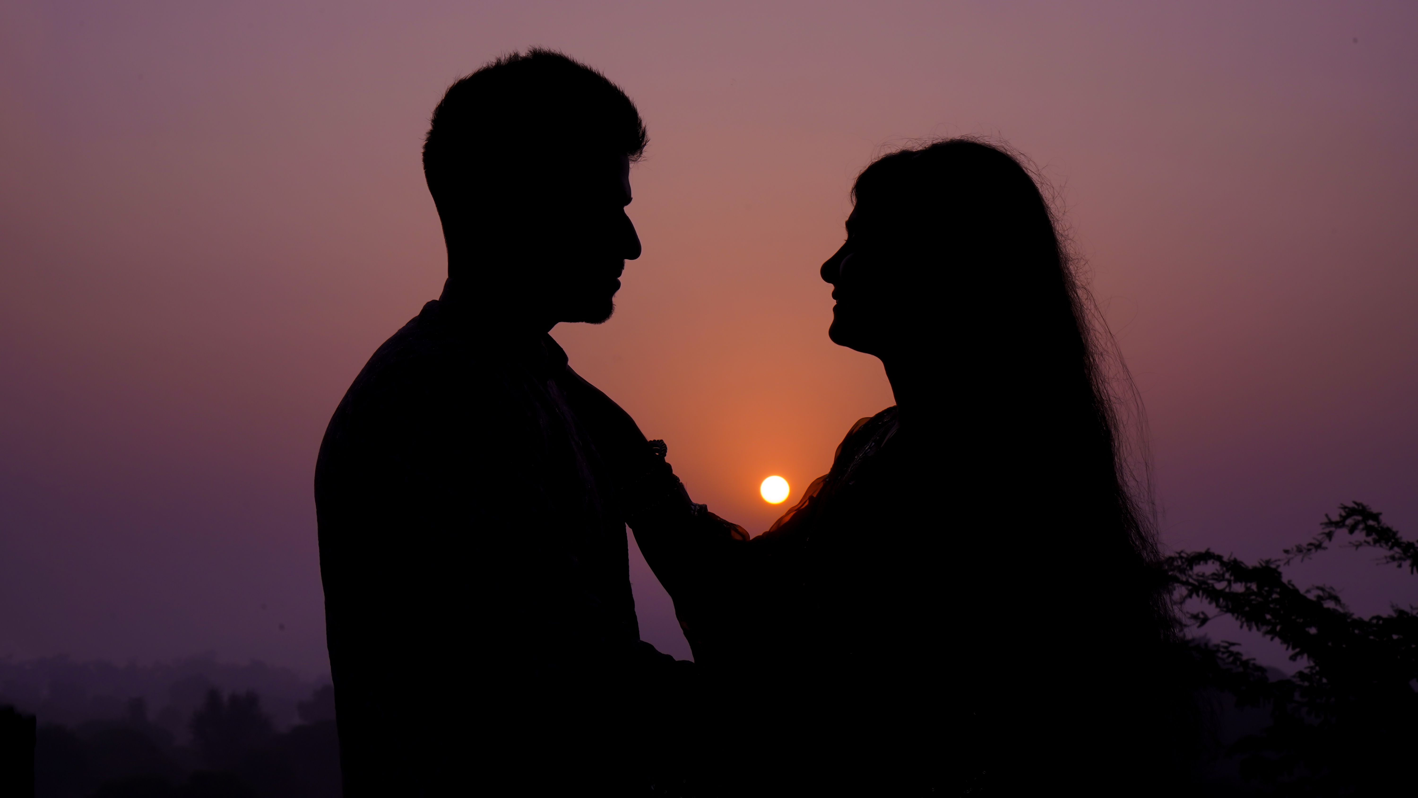 Silhouette of Romantic Couple at Sunset · Free Stock Photo