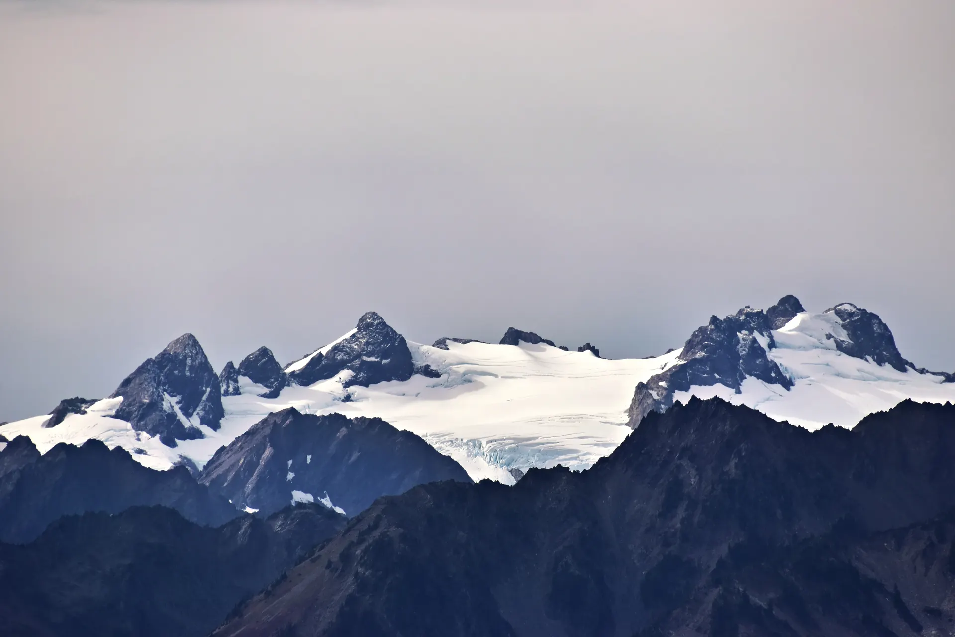 A breathtaking view of Mount Olympus with snow-capped peaks in Washington, USA.
