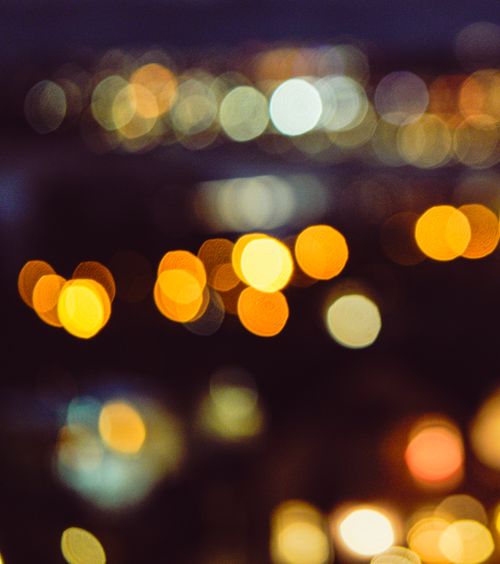Free A vibrant blend of colorful bokeh lights creating an abstract, dreamy atmosphere. Stock Photo
