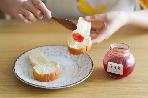 Person Holding Bread