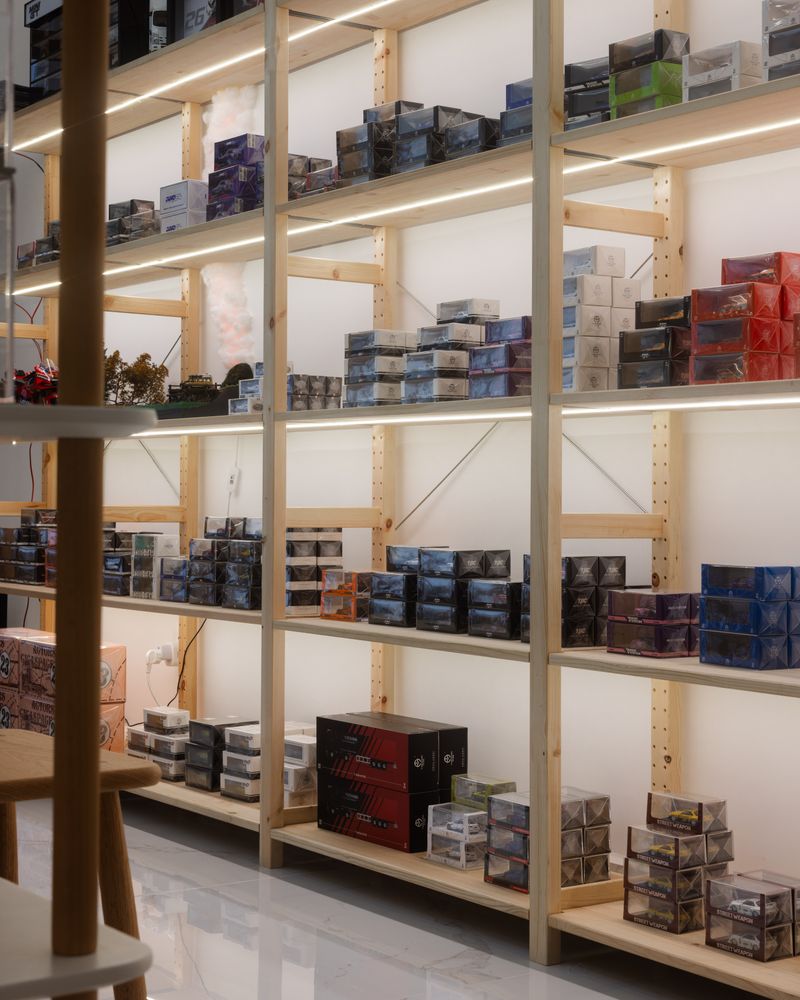 Toy convention displays showing designer art toy expo booths with collectible figures
