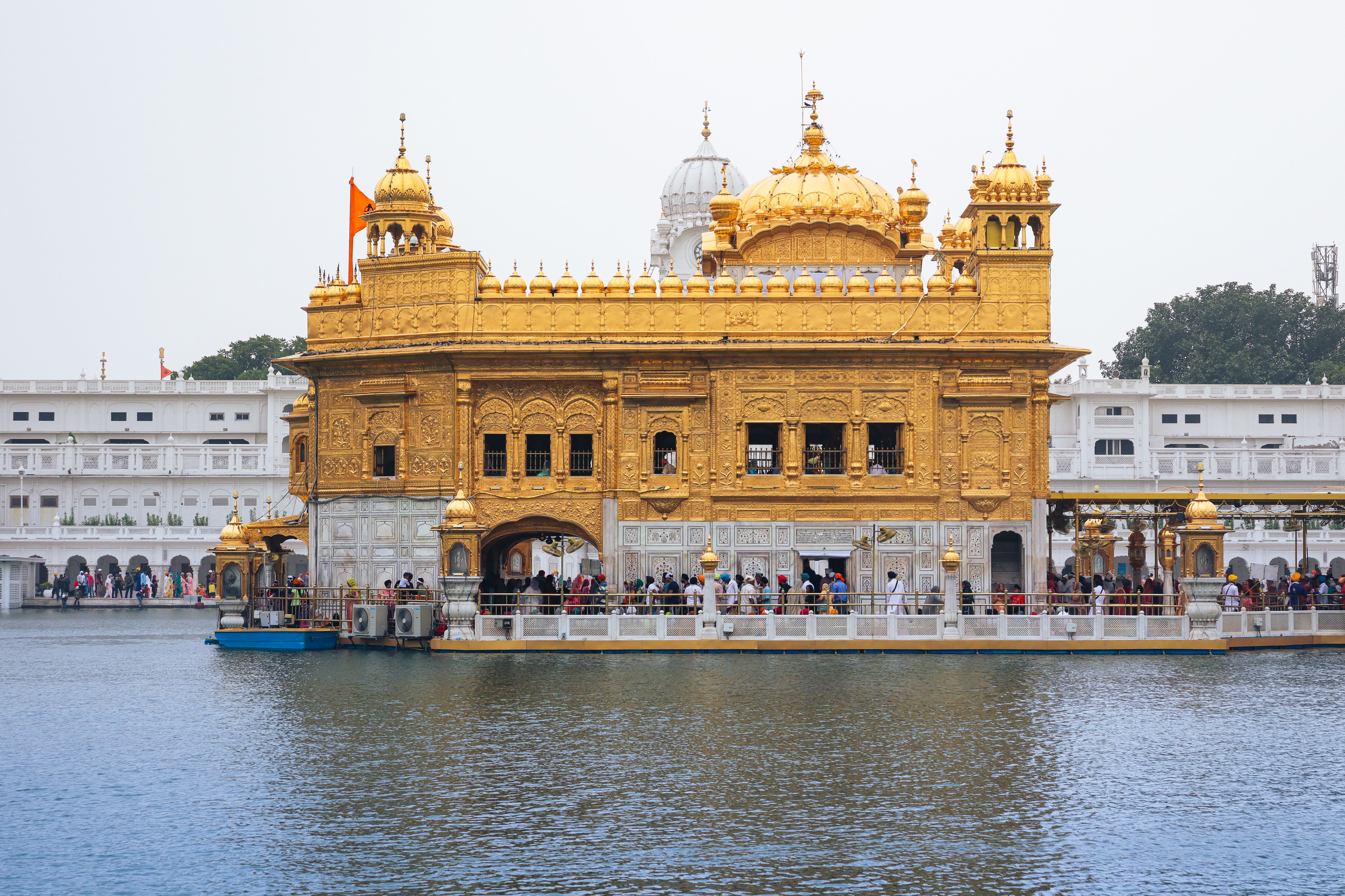 Narrow lane near the Golden Temple with hotel signage