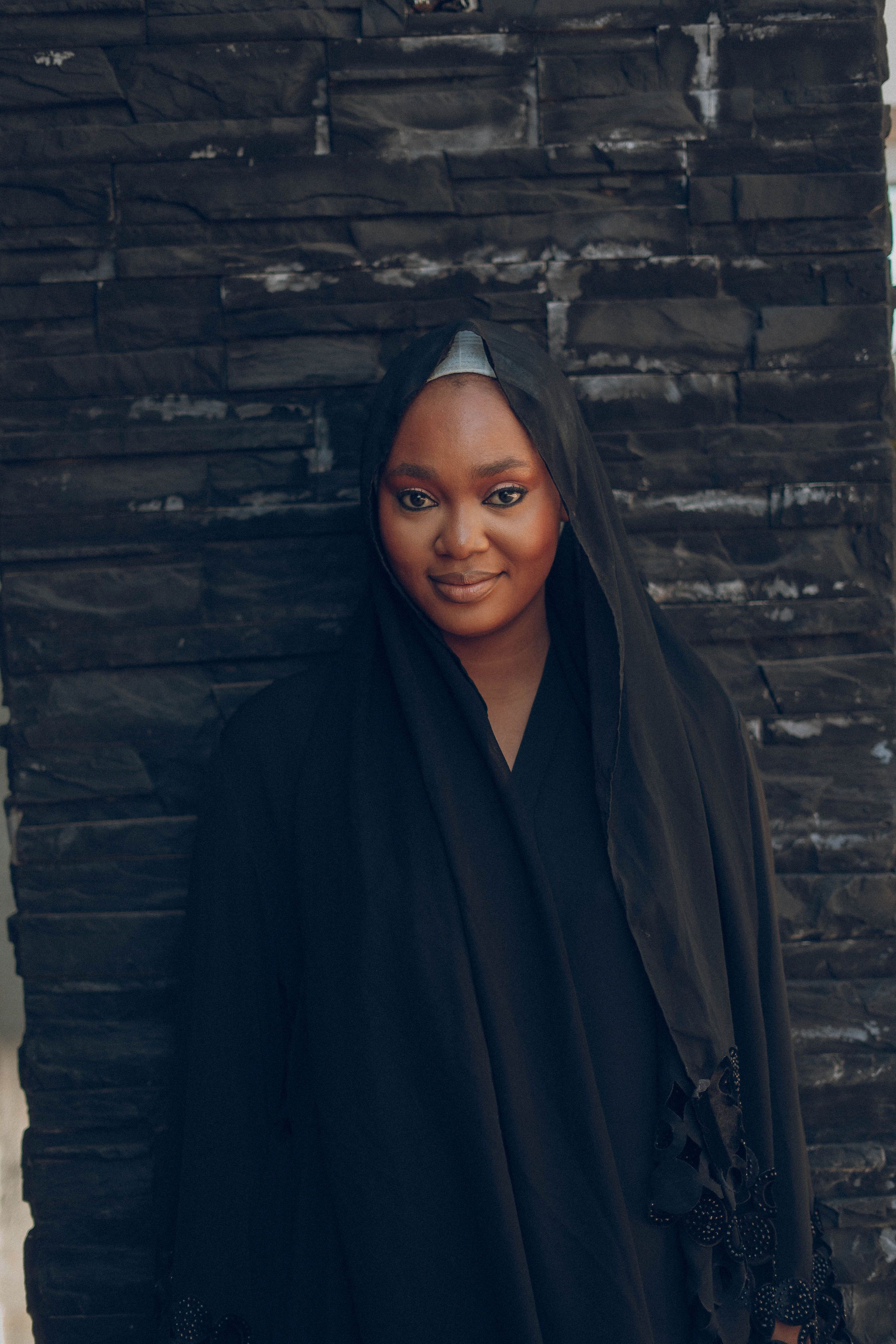 Elegant Portrait of a Woman in Black Hijab · Free Stock Photo