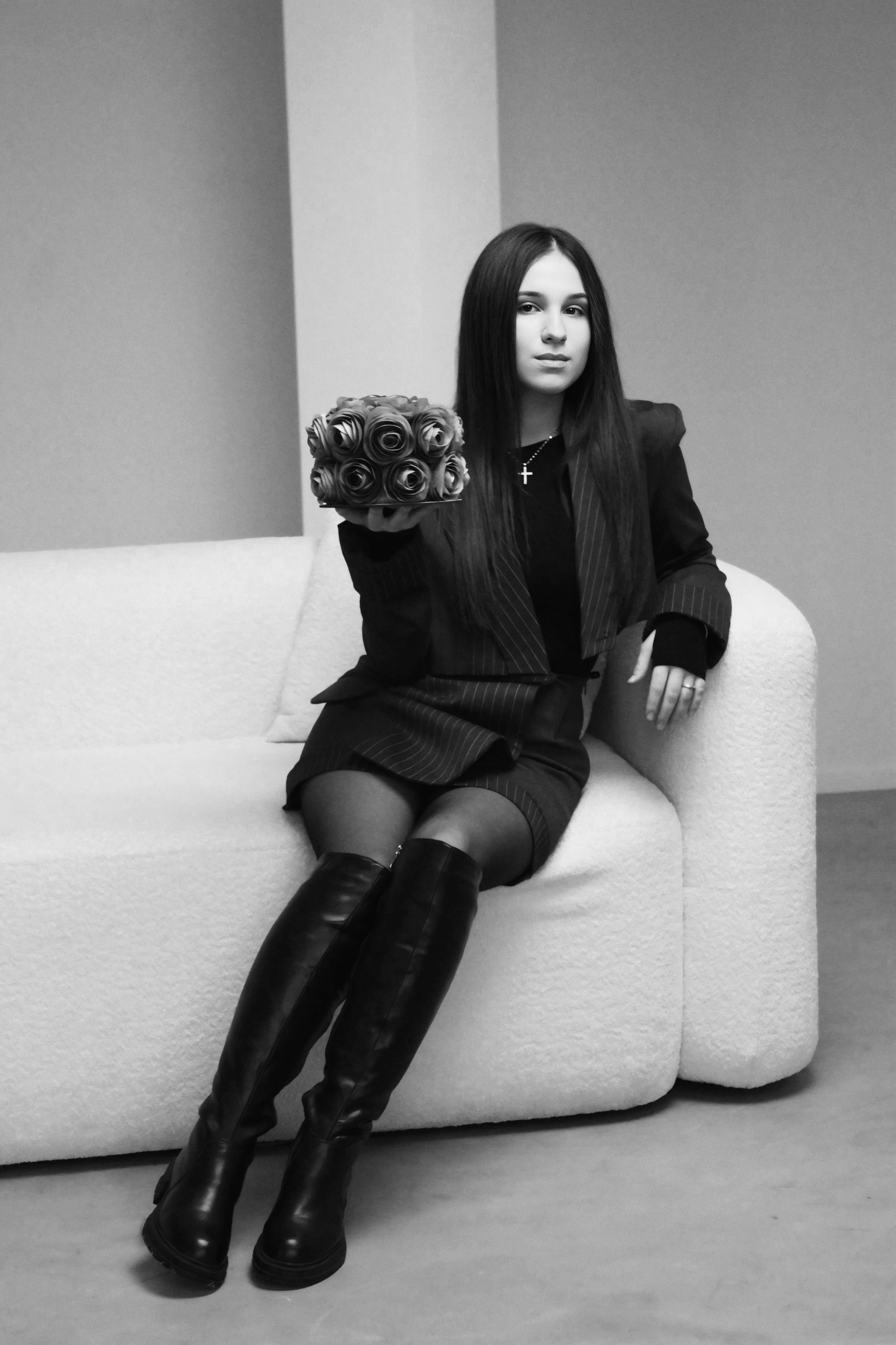 Stylish Woman Holding Roses in Black and White · Free Stock Photo