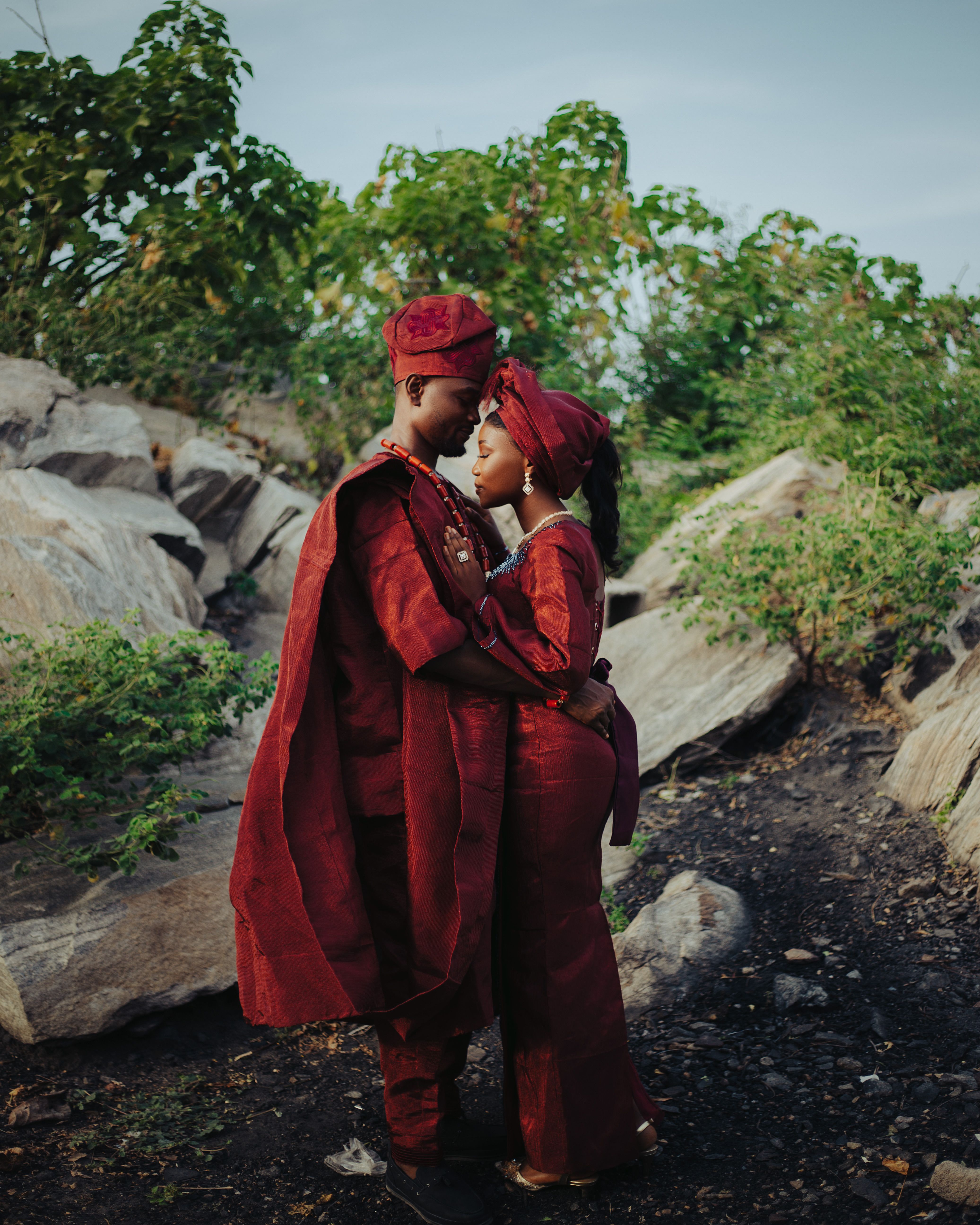 Romantic Couple in Traditional Attire Outdoors · Free Stock Photo