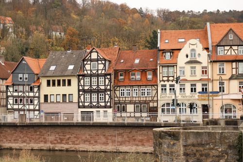 Free Picturesque Fachwerkhäuser buildings along the river in Hann. Münden during autumn. Stock Photo