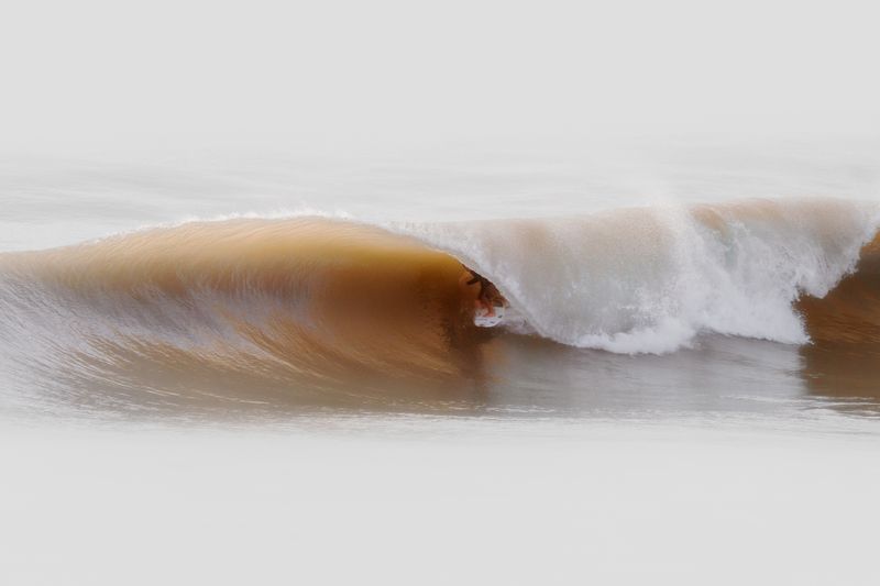 Perfect barreling wave breaking off the Miyazaki Pacific coast — year-round surf conditions on the Pacific-facing shore