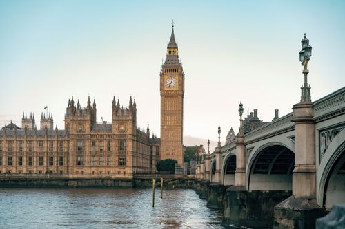 Free Iconic view of Big Ben and Westminster Bridge at sunset in London, UK. Stock Photo
