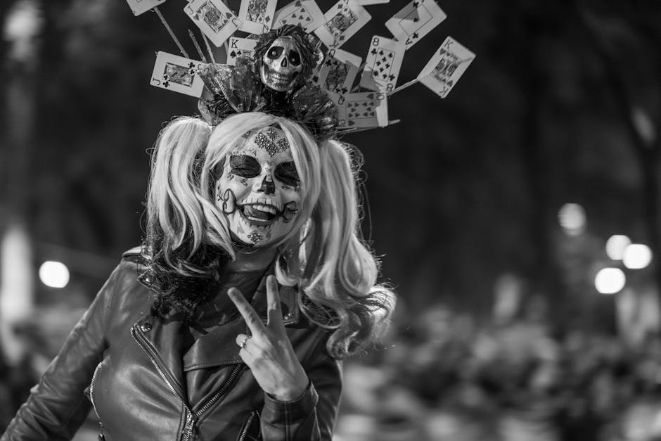 Colorful Day of the Dead makeup and costume during celebration in Mexico City.