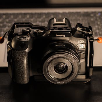 Close-up of a professional camera with wide-angle lens, ready for a photography session.
