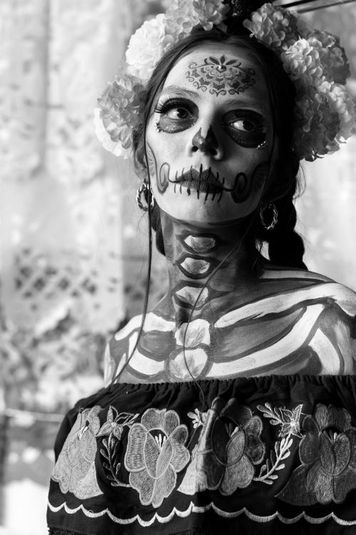 Free Catrina with intricate makeup and headdress, embodying Mexican traditions. Stock Photo
