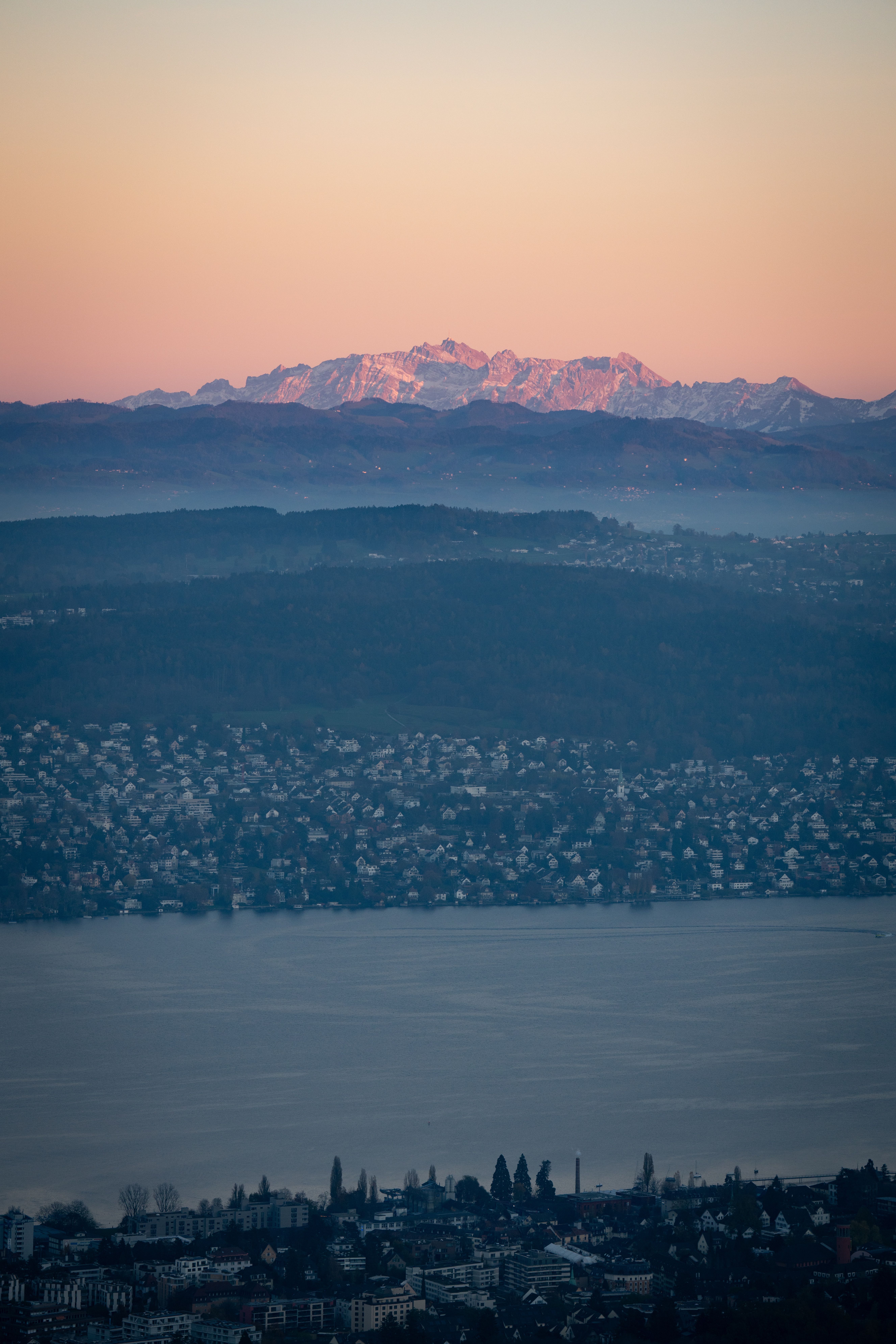 Aerial View of Zurich and Distant Alps at Sunset · Free Stock Photo