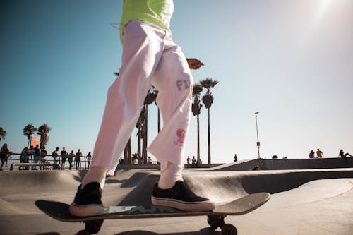 Free Man Riding on Skateboard Deck Stock Photo