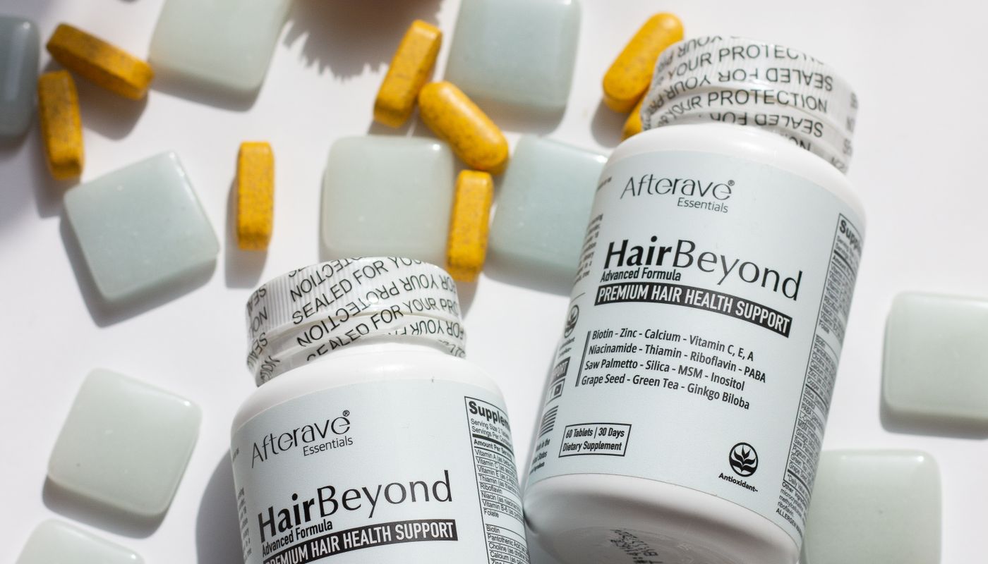 Juvenon supplement review — Hair Health Supplement Bottles on a Flat Lay · Free. Photo: Pexels
