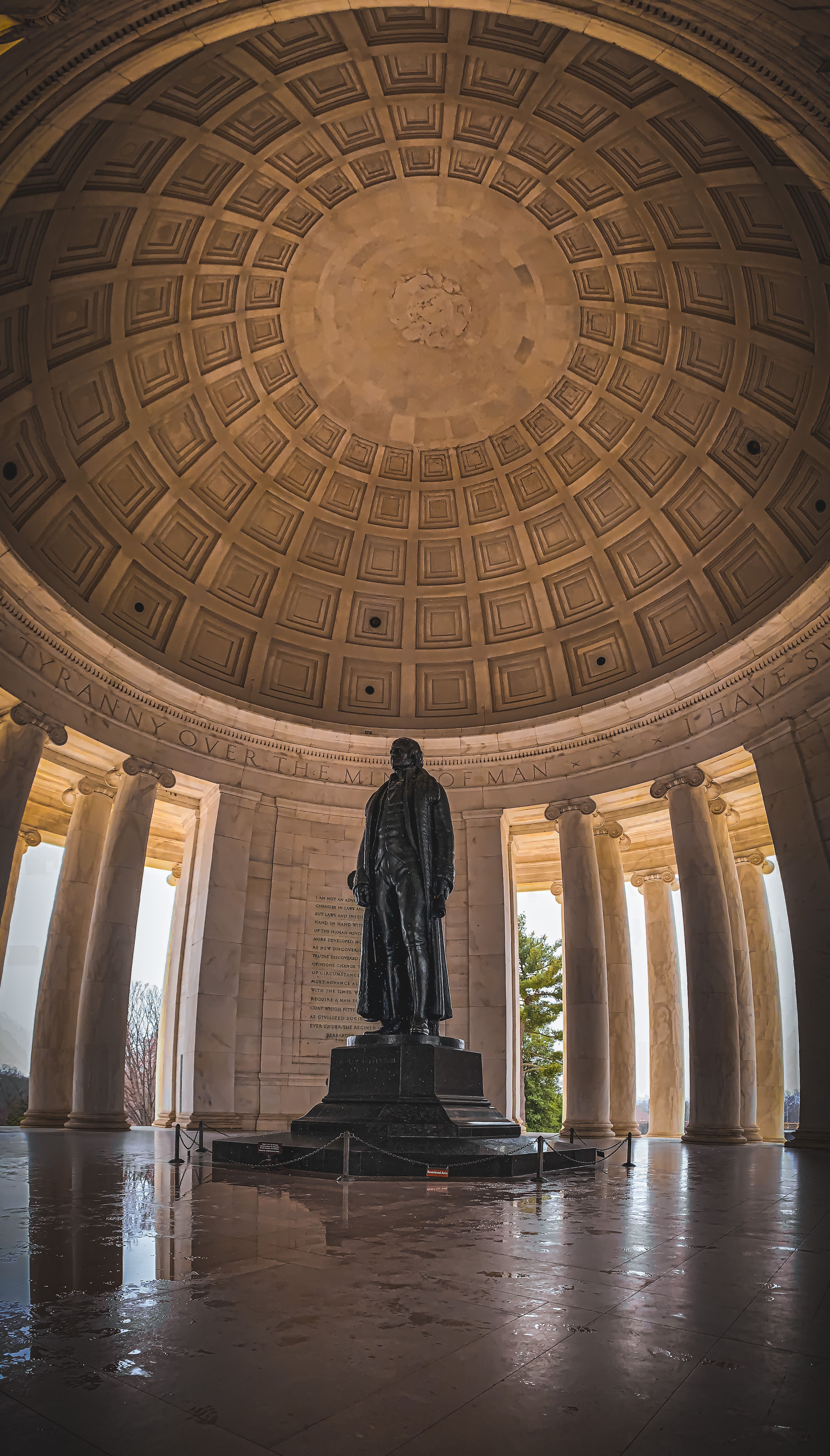 Explore the iconic interior of the Jefferson Memorial with its striking architecture and statue.