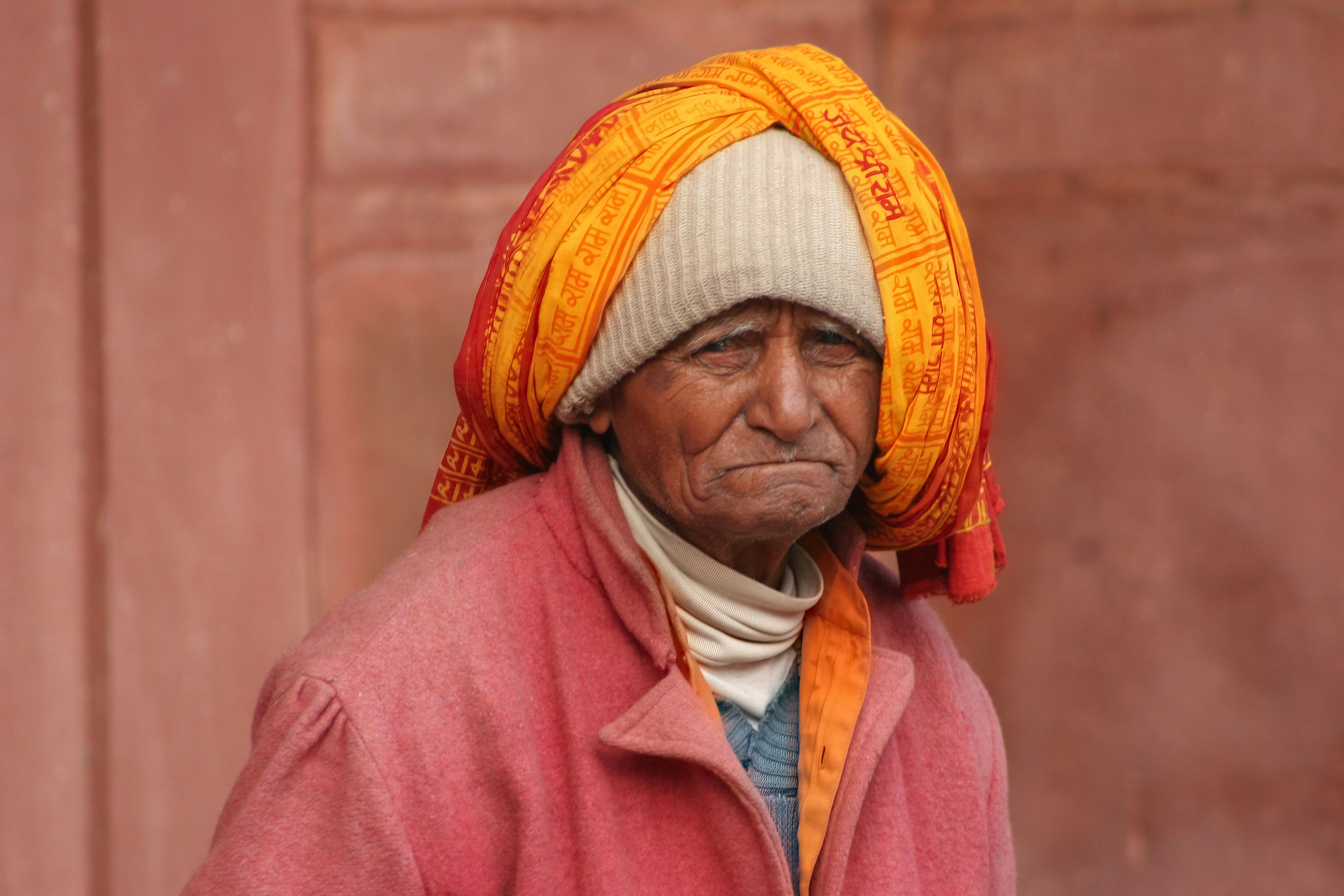 Elderly man in traditional turban and pink coat · Free Stock Photo