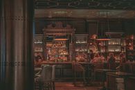 People Sitting In A Bar