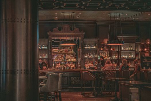People Sitting In A Bar