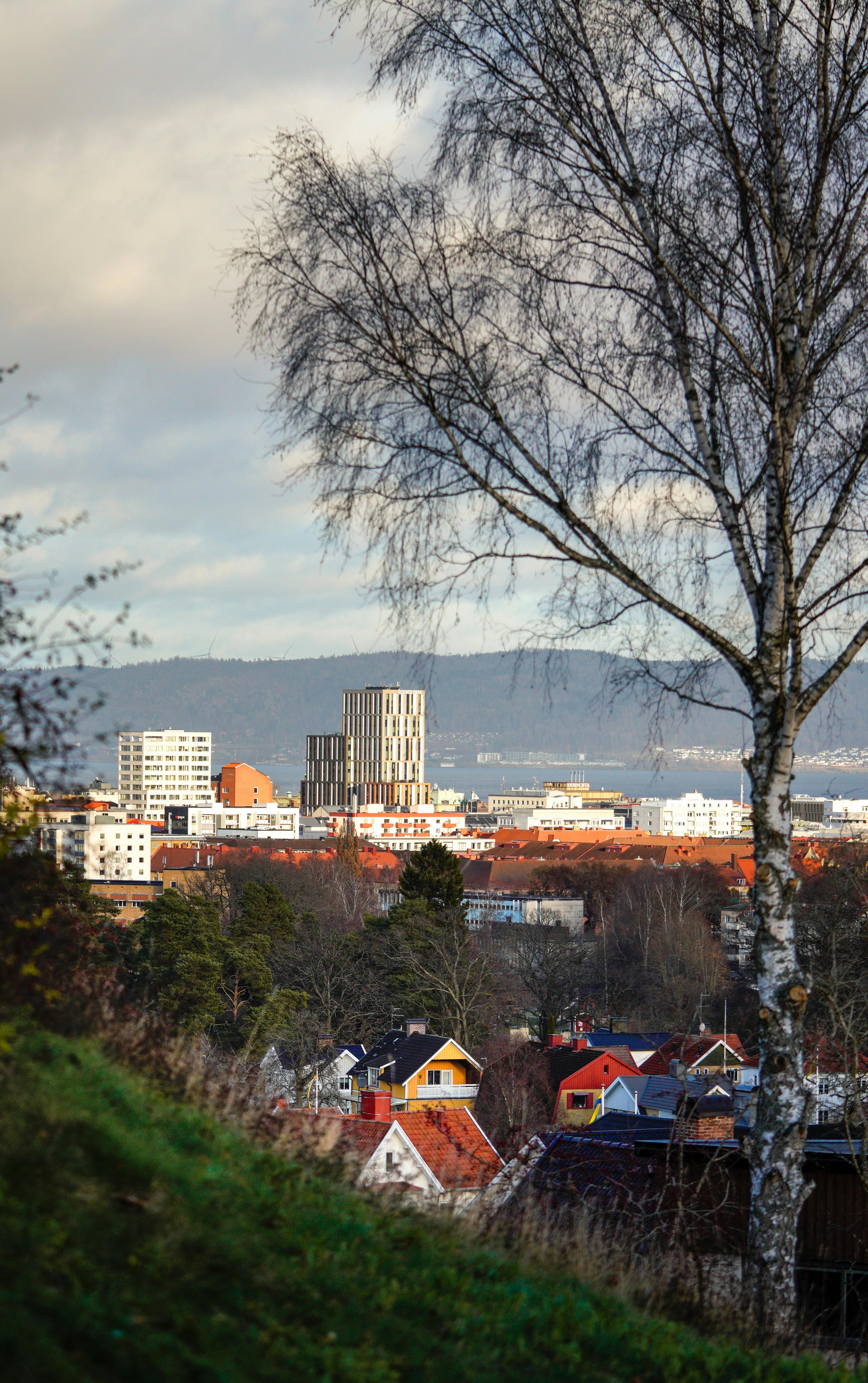 Cityscape of Jönköping, Sweden, featuring colorful houses and modern buildings in autumn.