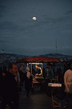 Atmospheric street vendor scene in Istanbul under moonlight.