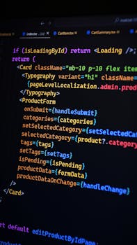 Close-up of JSX code on a monitor, showcasing colorful syntax used in ReactJS development.