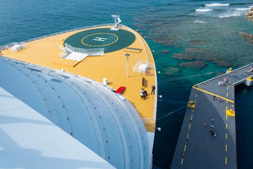 Yellow and White Ship Near Road