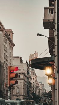 Explore Barcelona's elegant architecture and vibrant street life during dusk.