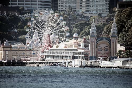 Free Iconic Luna Park with ferris wheel overlooking Sydney Harbour in New South Wales, Australia. Stock Photo