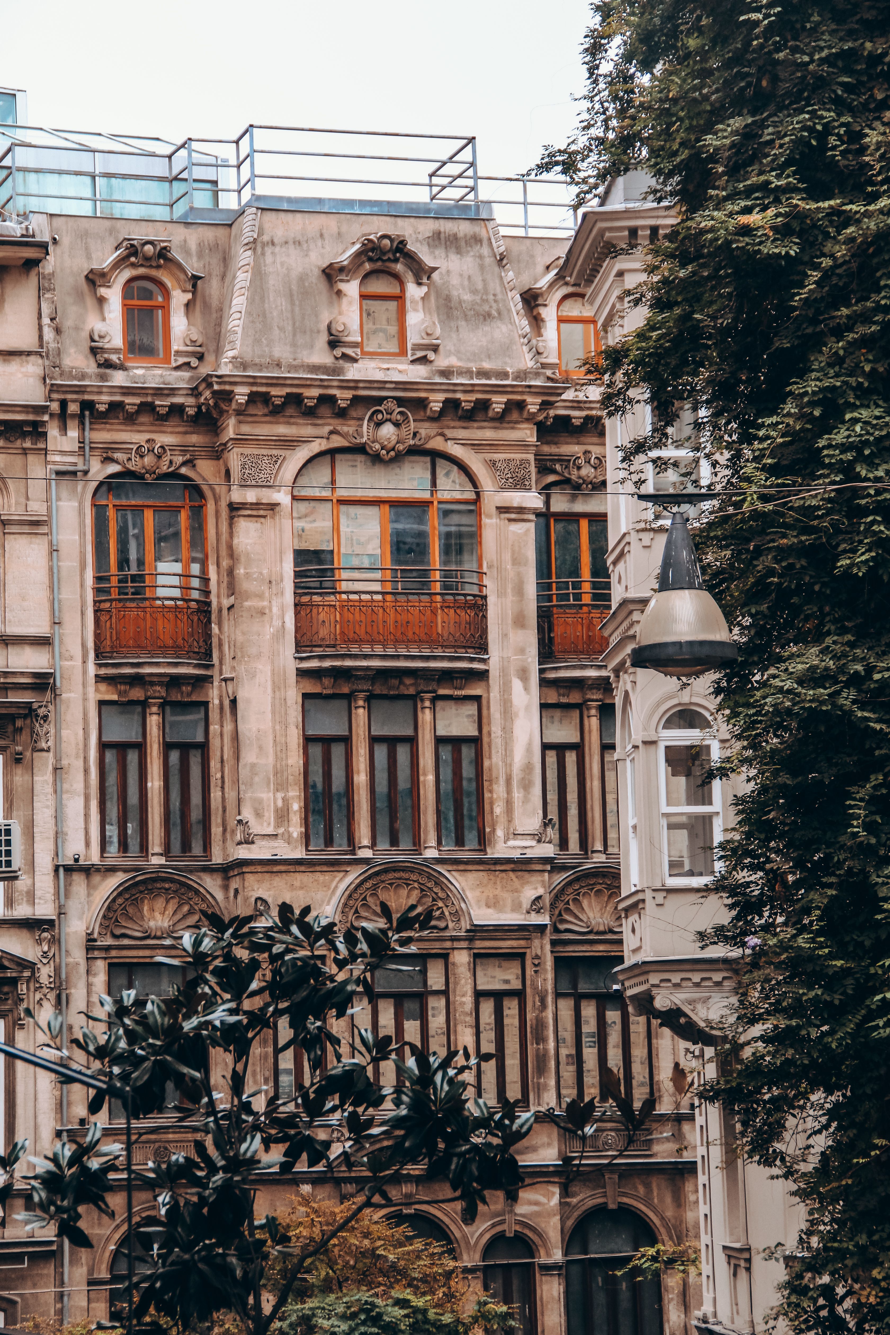 Historic European Architecture with Ornate Facade · Free Stock Photo