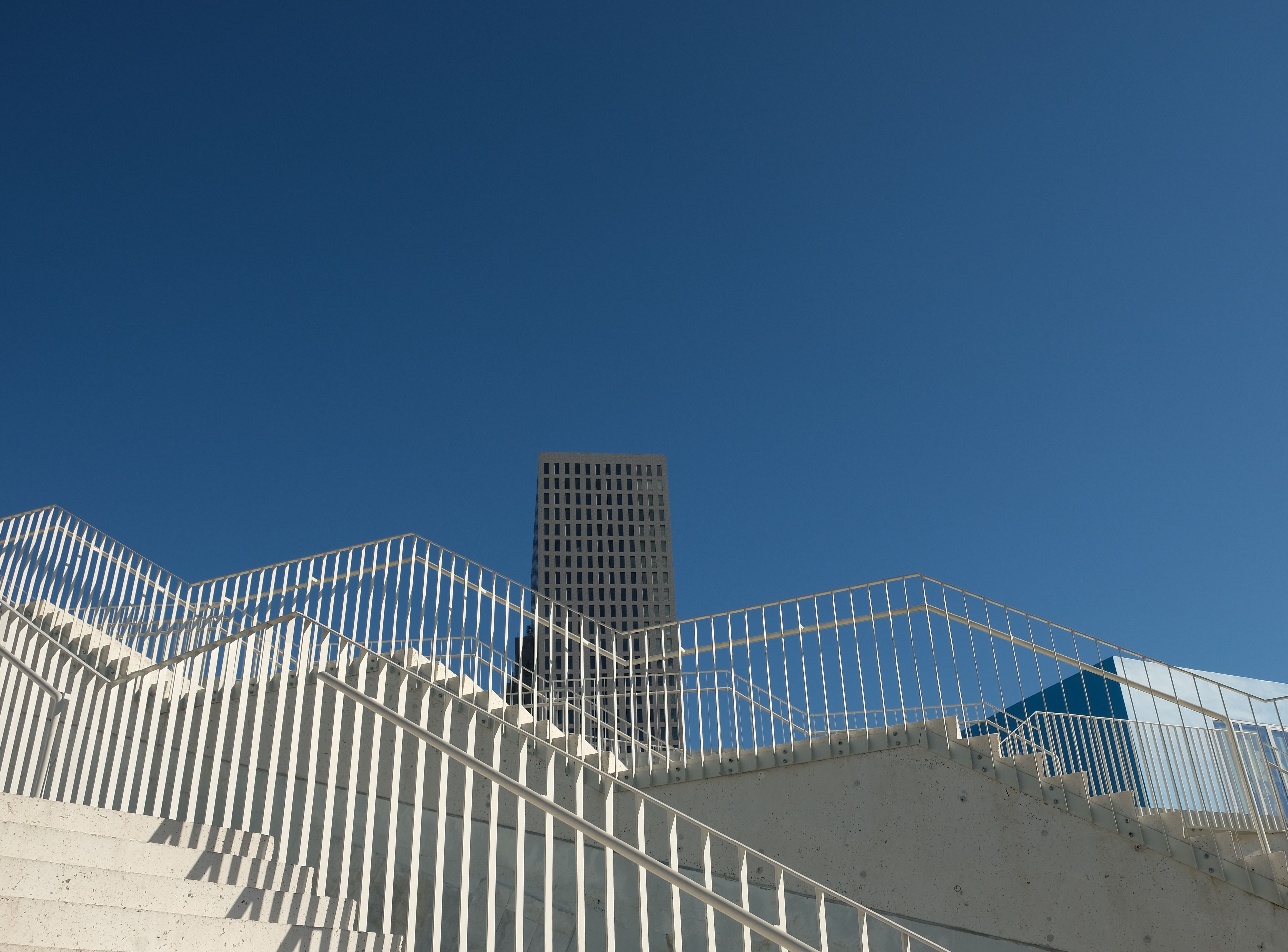 Modern Architecture with Blue Sky Background · Free Stock Photo