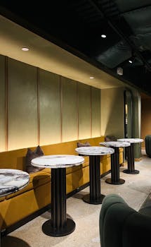Elegant cafe interior featuring marble tables and contemporary design. Perfect for modern dining concepts.