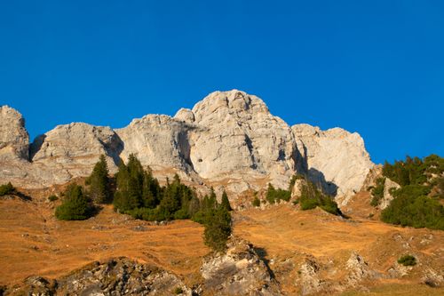 Free Beautiful mountain landscape in Walenstadt, Switzerland during a sunny day with clear blue skies. Stock Photo