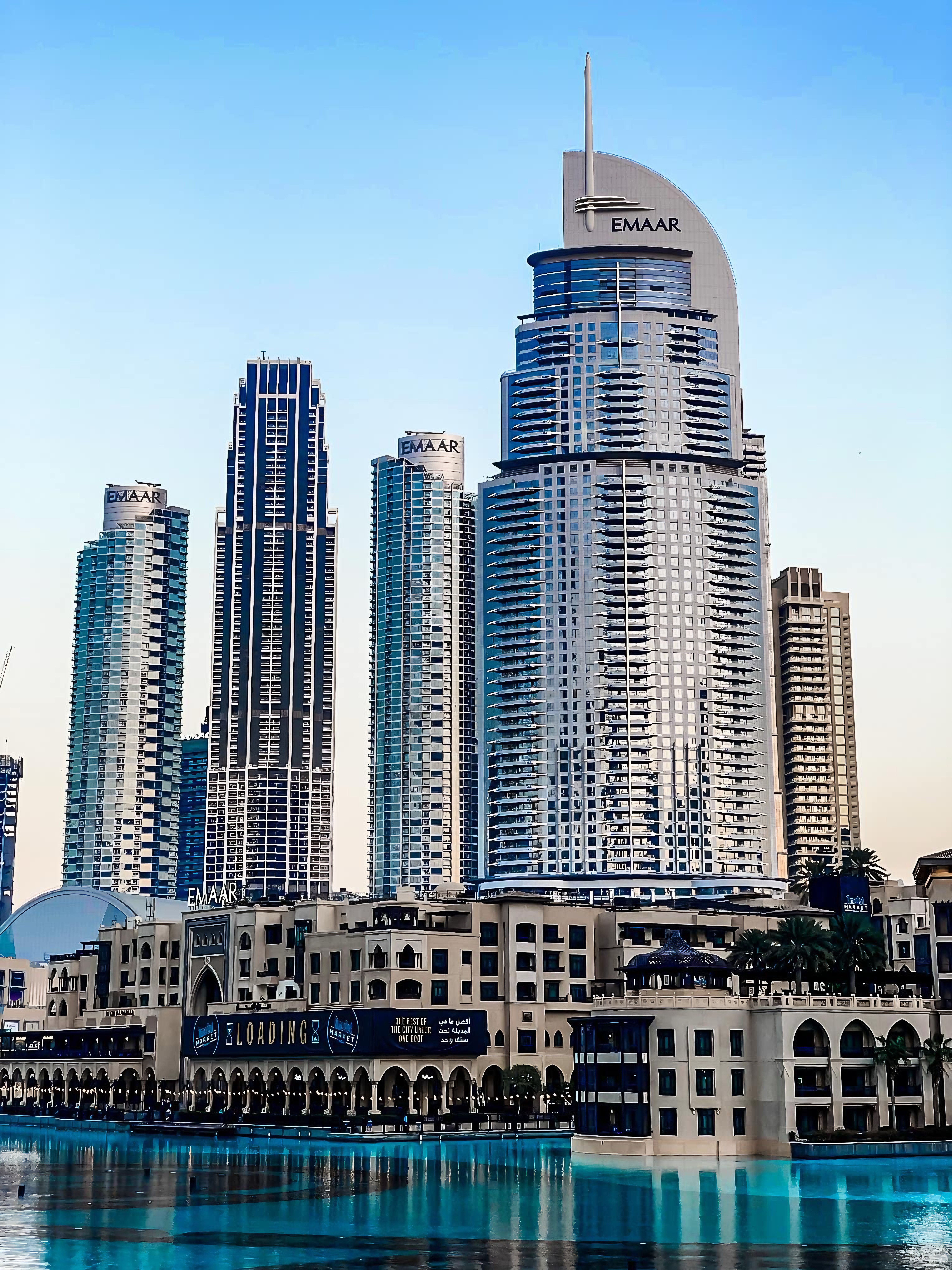 Skyscrapers in Dubai reflecting in water