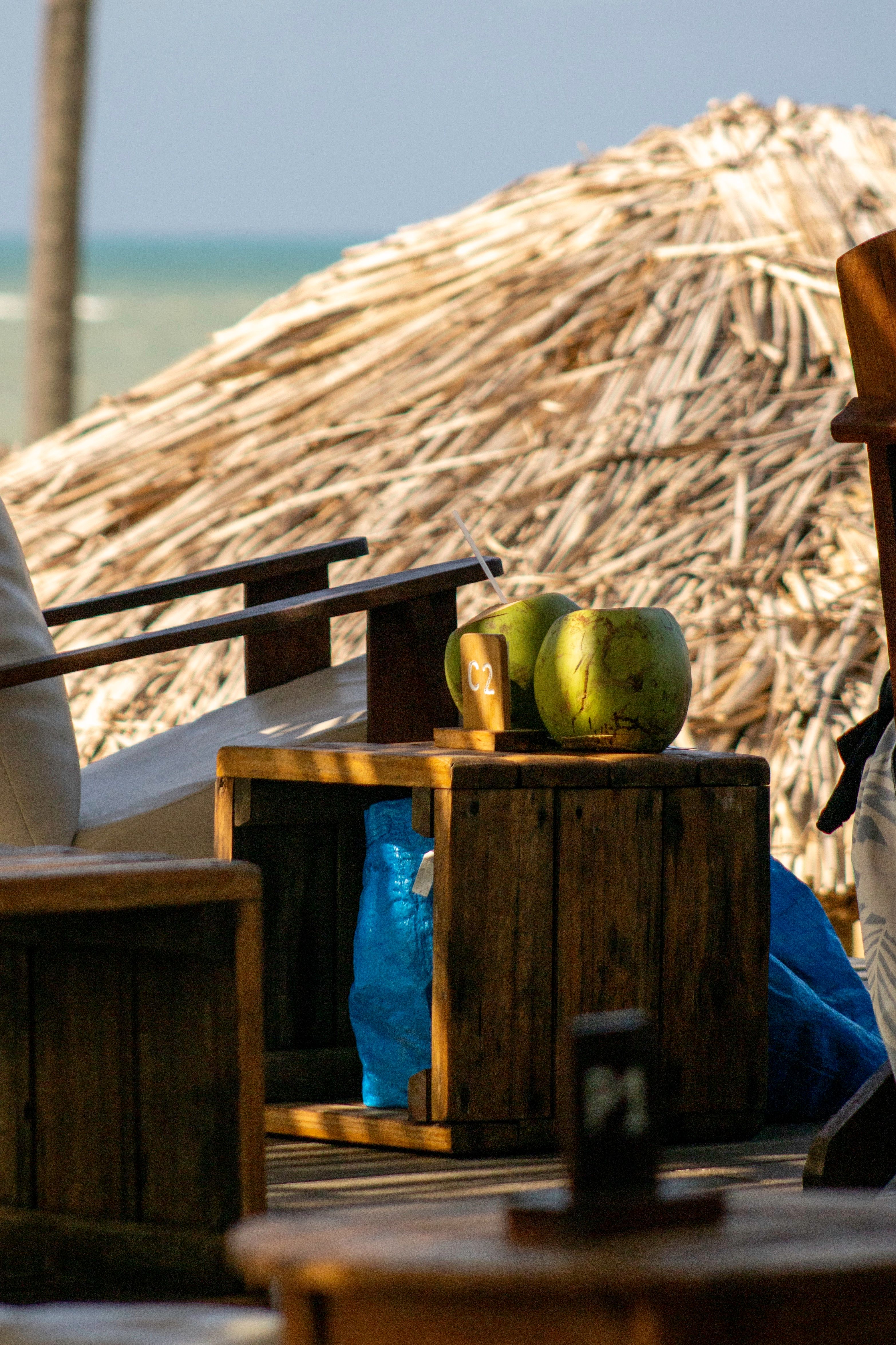 Tropical Beach Cabana with Refreshing Coconut Drinks · Free Stock Photo
