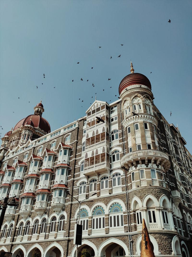 Taj Mahal Palace hotel in Mumbai under a clear sky