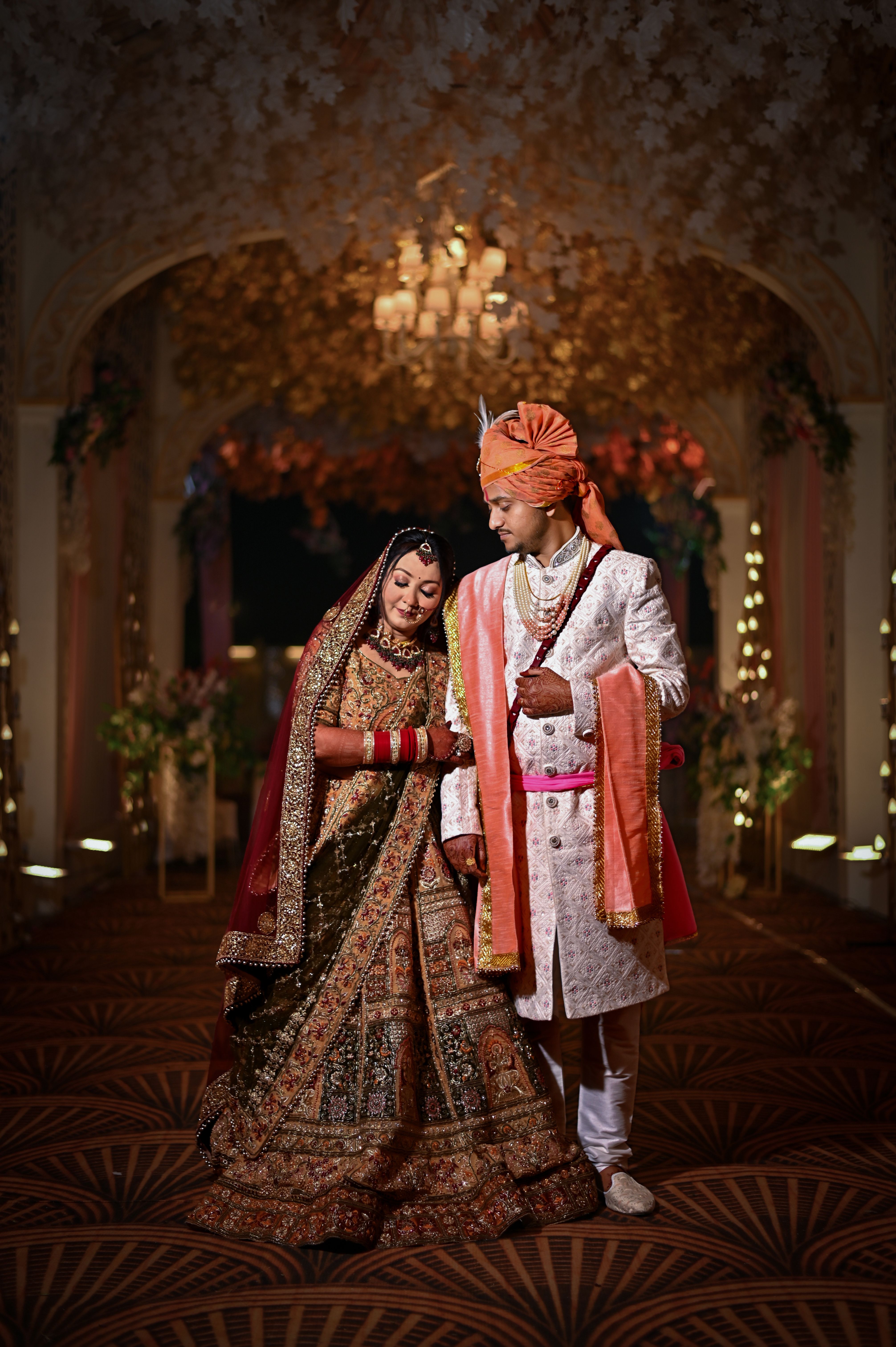 Elegant Indian Wedding Couple in Traditional Attire · Free Stock Photo