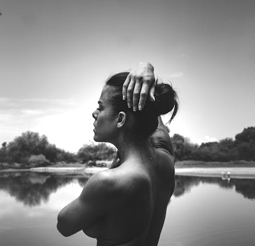 Free Naked Woman Near Water Stock Photo