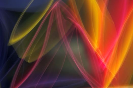 Bright and colorful abstract light trails creating dynamic patterns.