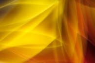 Vibrant Abstract Yellow and Orange Light Waves
