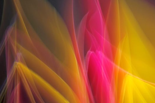 Dynamic abstract art with flowing colorful light streaks. Perfect for vibrant backgrounds.