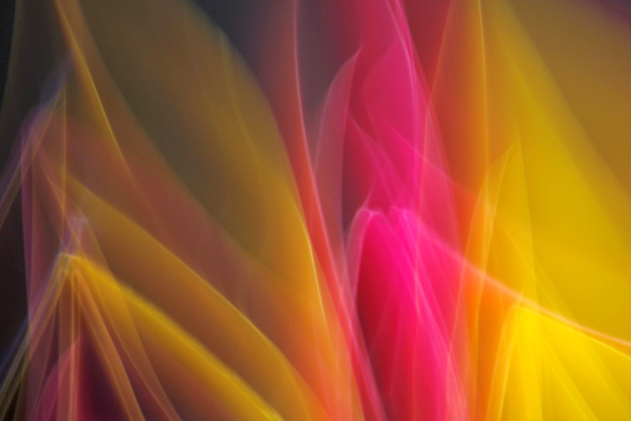 dynamic abstract art with flowing colorful light streaks perfect for v