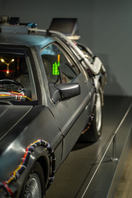 Free Close-up of a futuristic, retro-styled car resembling a time machine. Perfect for nostalgia. Stock Photo