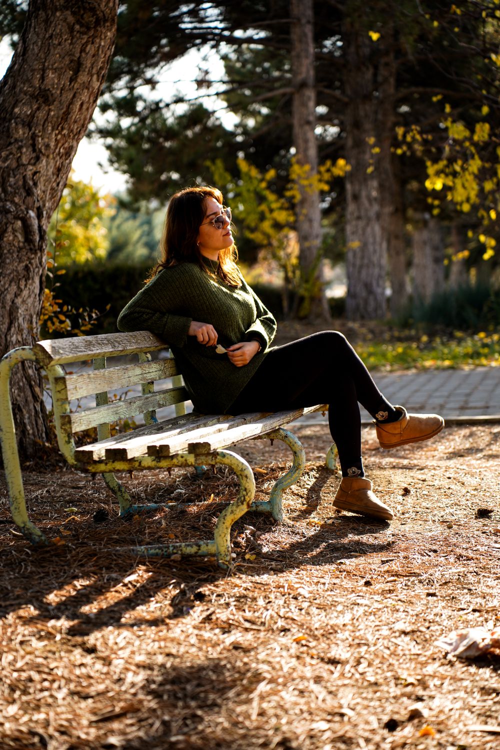 Woman Relaxing on Park Bench in Ankara Autumn · Free Stock Photo